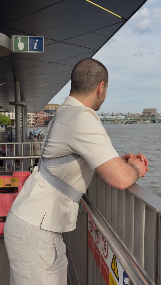 Back support belt covering the full back, promotes healthy posture while sitting, standing, or lifting, reduces strain and supports spinal alignment