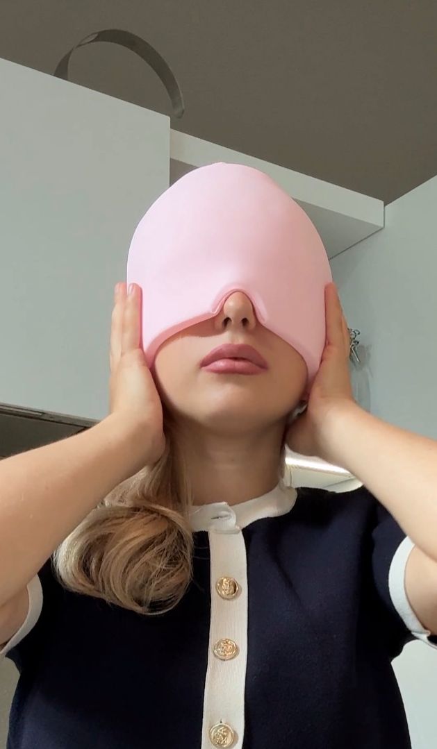 Pink migraine relief cap for hot and cold therapy – soothes headaches, neck pain, facial pressure, and reduces eye puffiness