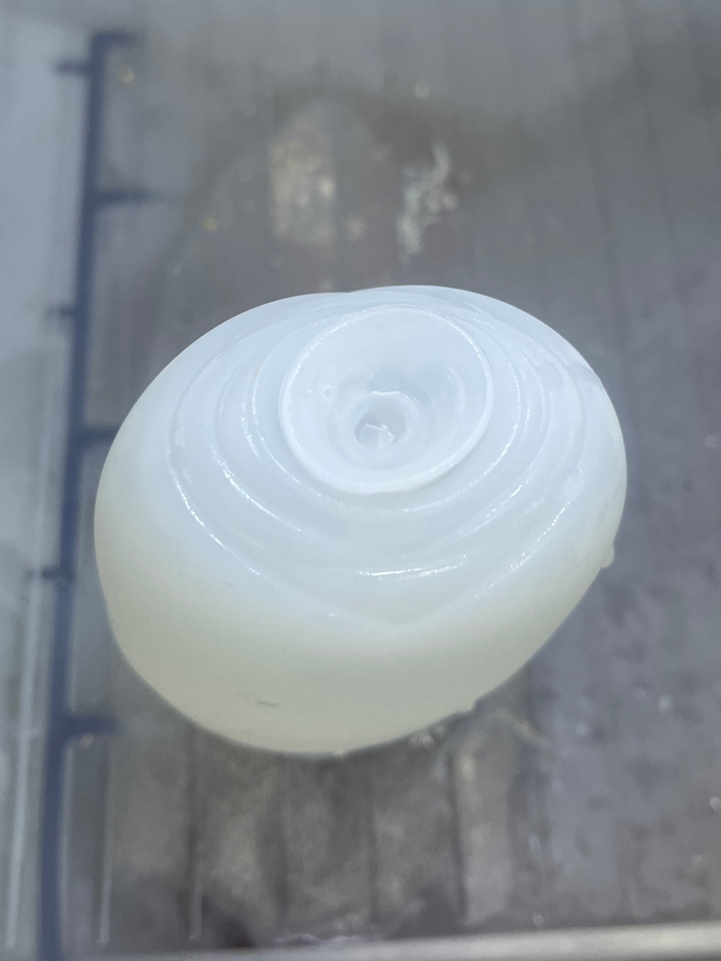 Transparent CrystalGlow ice roller for face massage and puffiness reduction